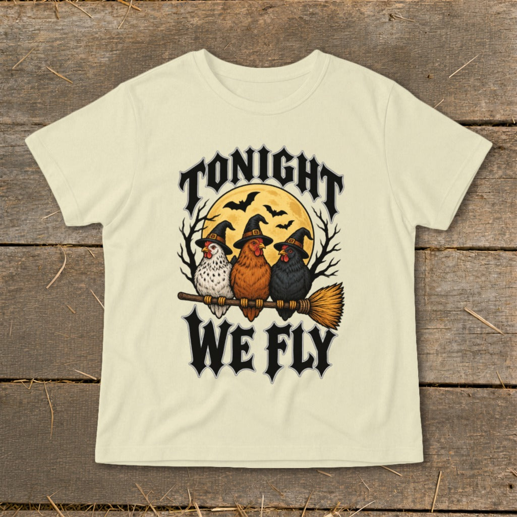 Three witch-hatted chickens fly on a broomstick with the text "Tonight We Fly."
