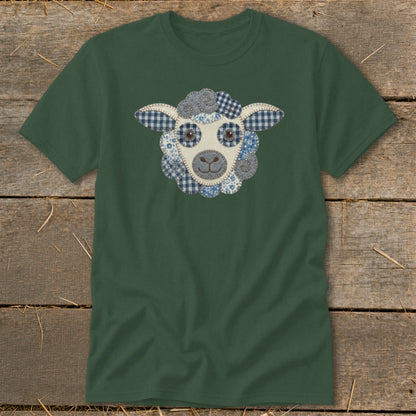 Green t-shirt with a blue and white fabric-patched sheep face applique.