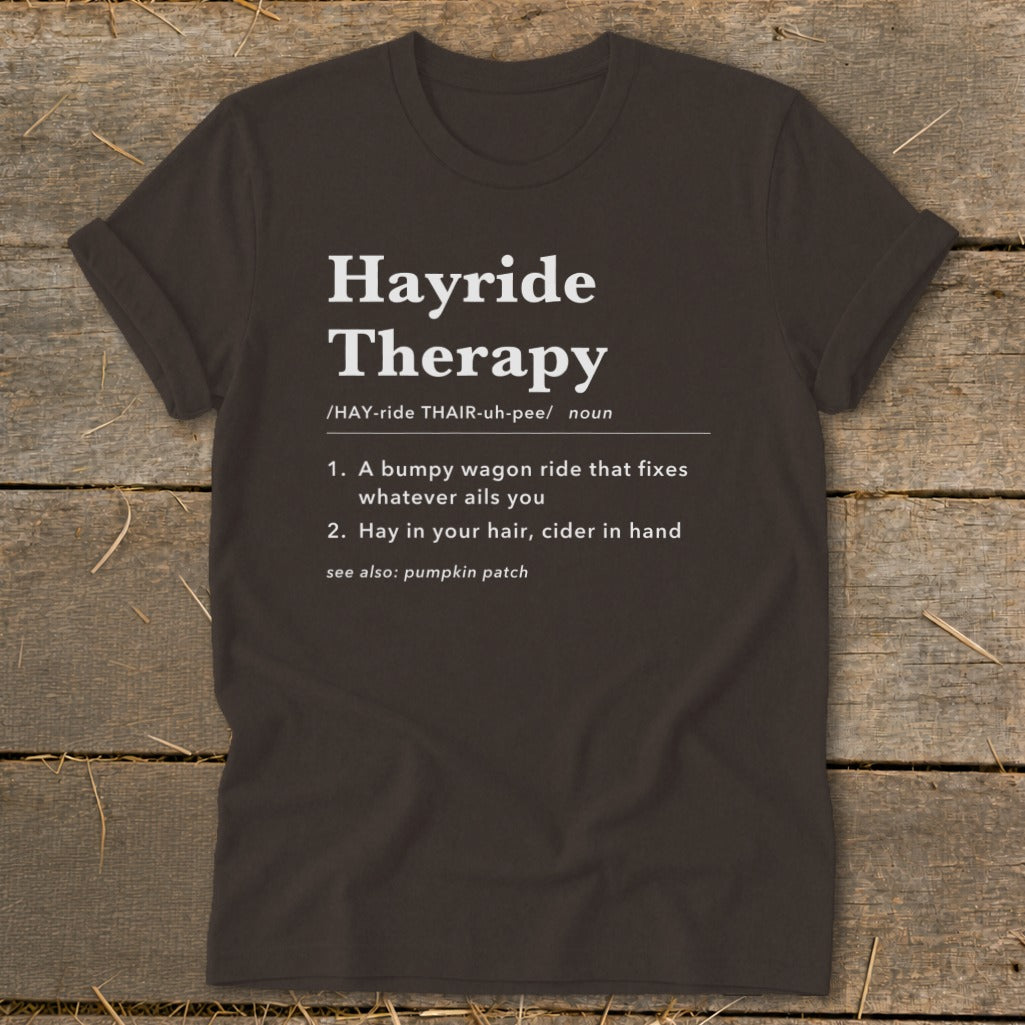 Dark t-shirt with "Hayride Therapy" definition: bumpy wagon ride fixes woes.