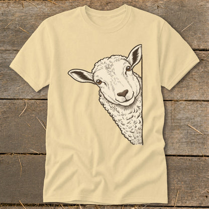 Light yellow t-shirt with a black and white illustration of a sheep peeking from the side.