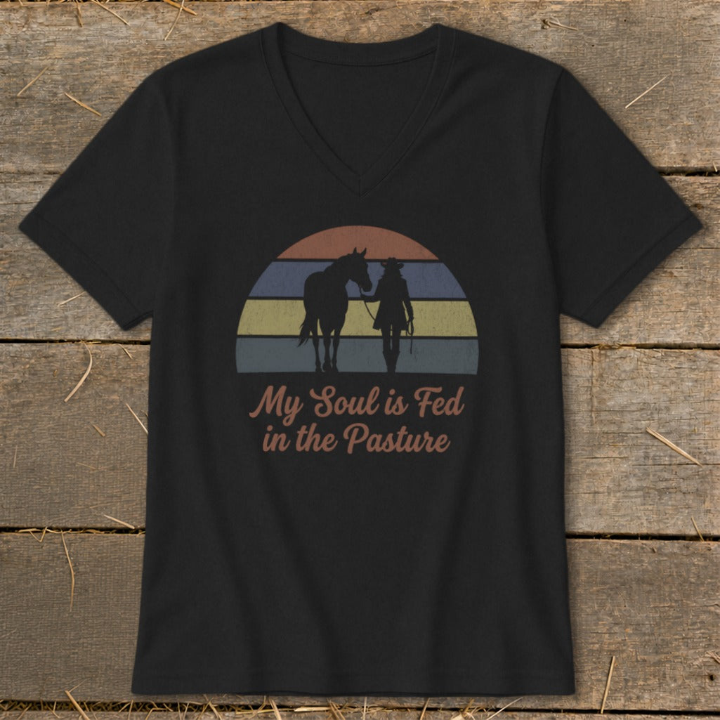 Black t-shirt with retro sunset graphic of a horse and person.