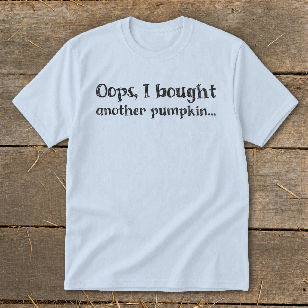 Light blue t-shirt with black text: "Oops, I bought another pumpkin..."