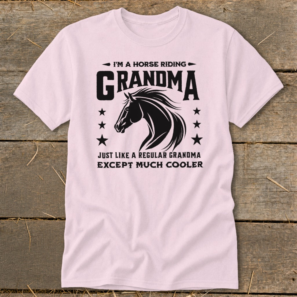 Pink t-shirt with black text and horse graphic saying "I'm a horse riding Grandma".