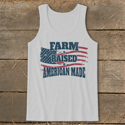 White tank top with distressed American flag and text "FARM RAISED AMERICAN MADE".