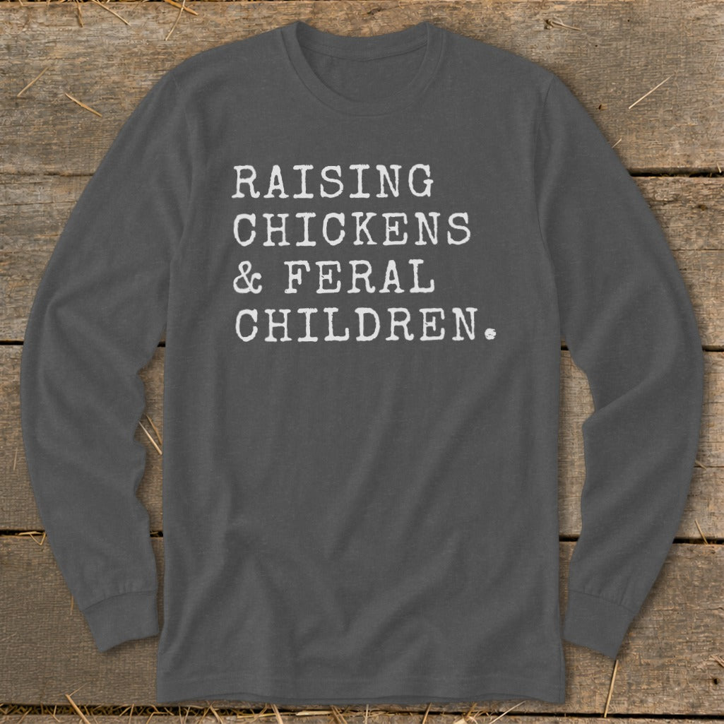 Long sleeve charcoal shirt with white text: "RAISING CHICKENS & FERAL CHILDREN."