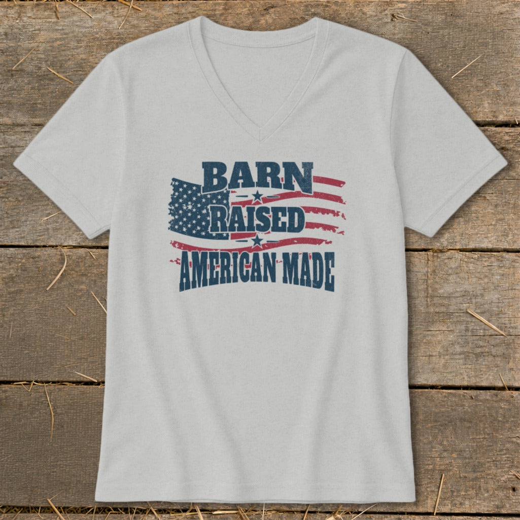Light gray v-neck t-shirt with distressed American flag and text "BARN RAISED AMERICAN MADE".