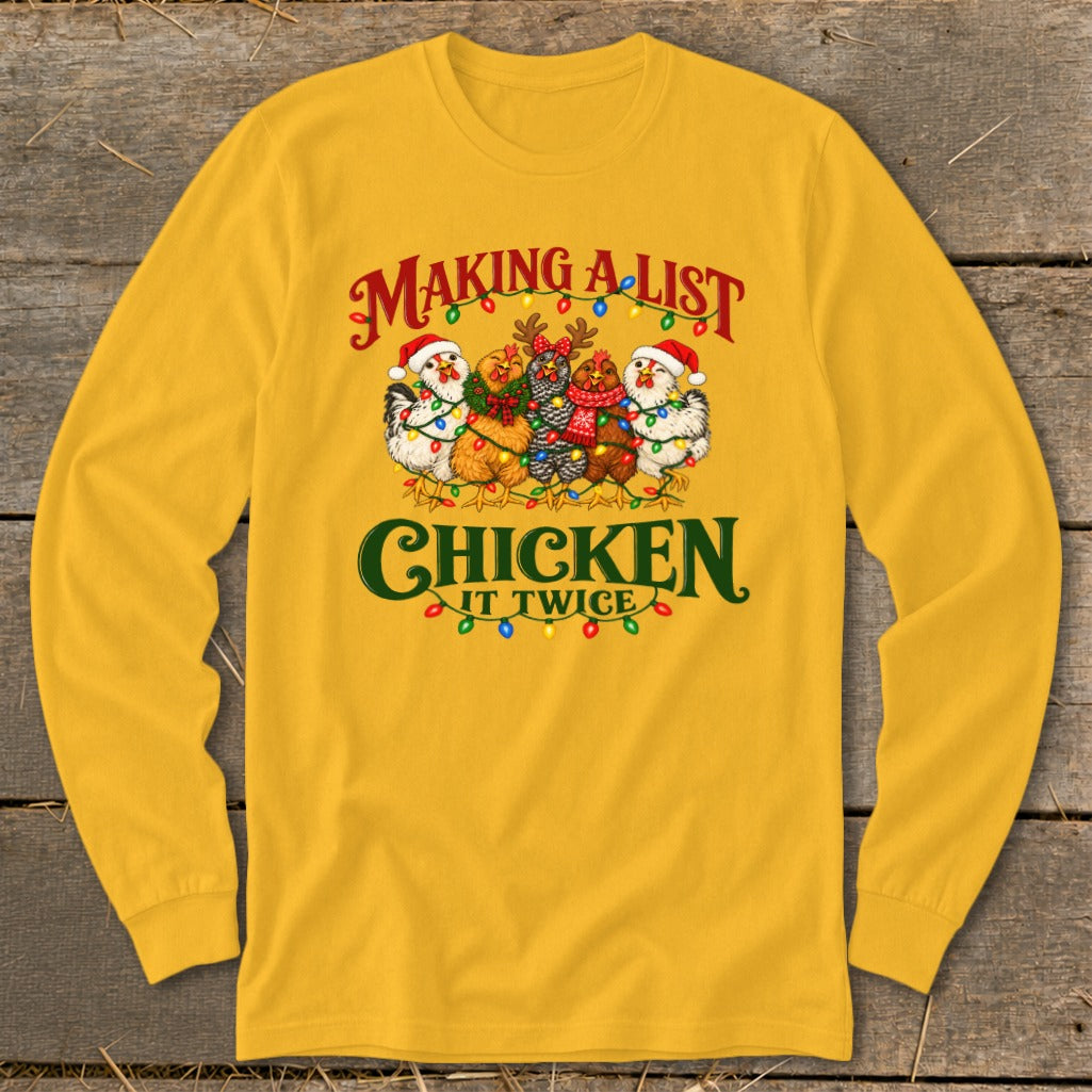 Yellow long-sleeve shirt with chickens wearing Santa hats and Christmas lights.