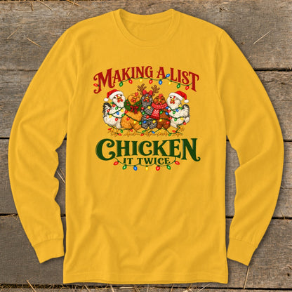 Yellow long-sleeve shirt with chickens wearing Santa hats and Christmas lights.