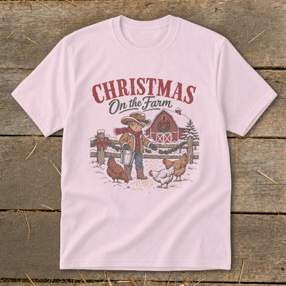 Pink t-shirt with "Christmas On the Farm" text and farm scene graphic.
