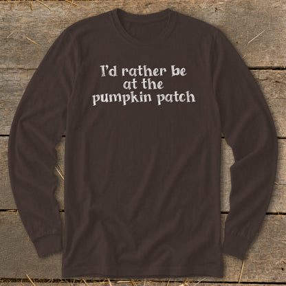 Brown long-sleeve shirt with white text "I'd rather be at the pumpkin patch."
