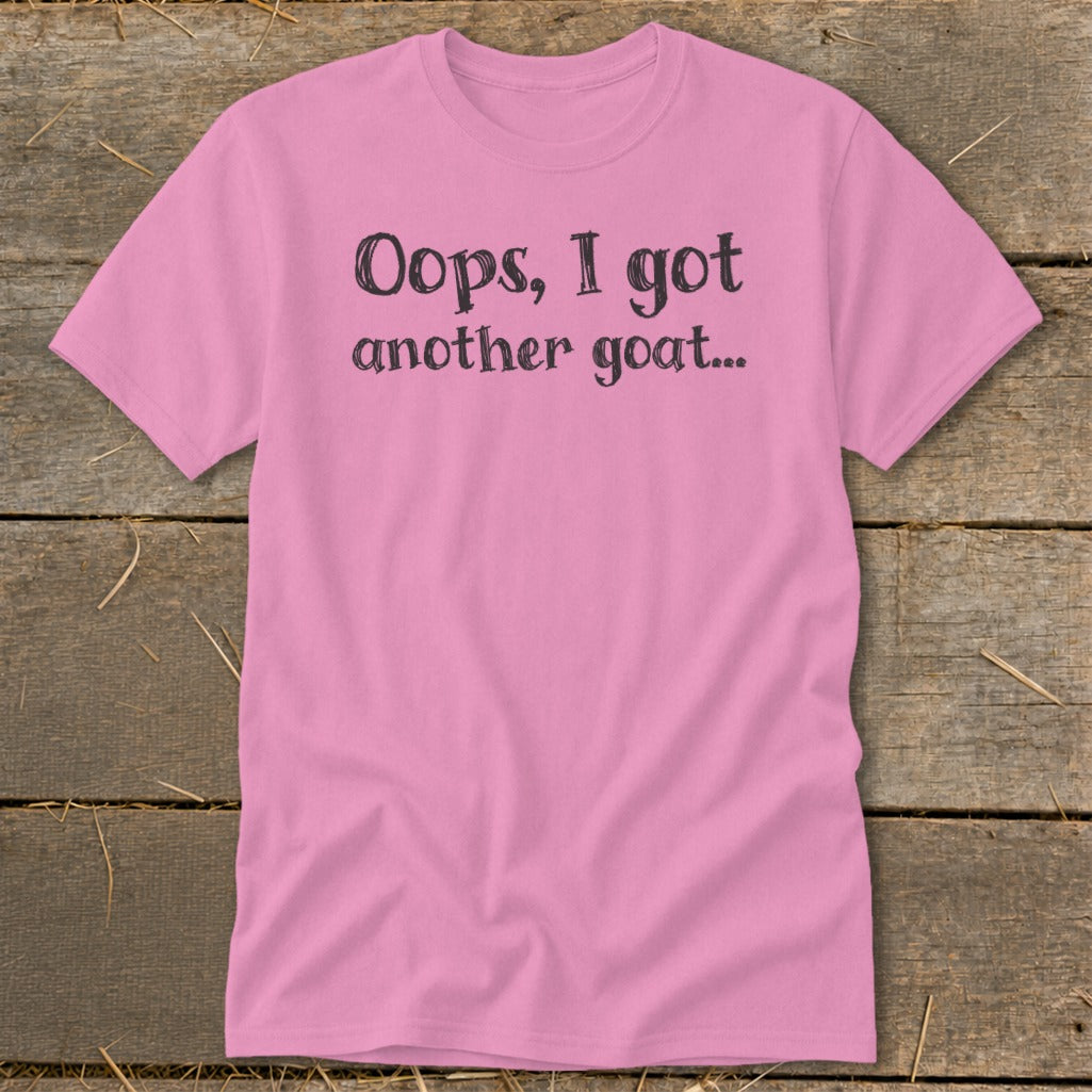 Pink t-shirt with black text reading "Oops, I got another goat..."