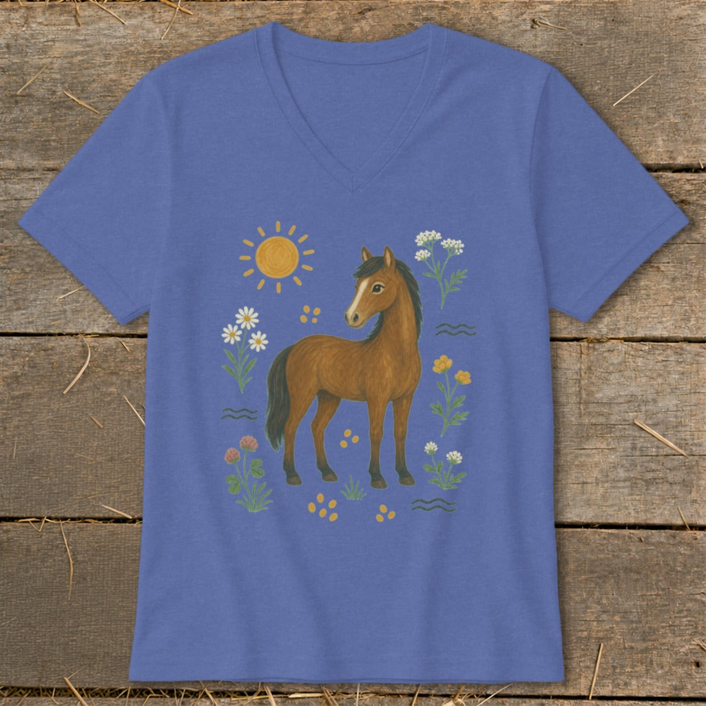 Brown horse with flowers, sun, and wavy lines on a purple t-shirt.