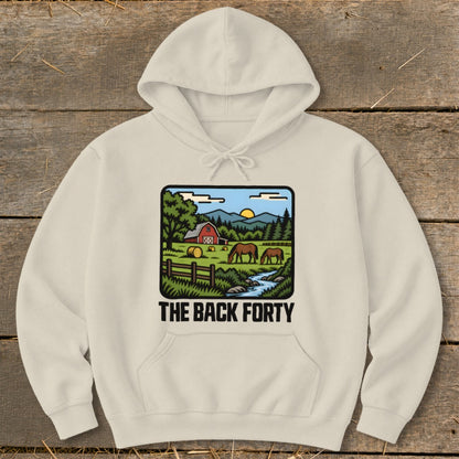Off-white hooded sweatshirt featuring a retro graphic of horses grazing in a farm landscape with the text THE BACK FORTY.