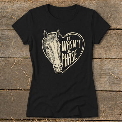 Black t-shirt with a horse head inside a heart and text "it wasn't a phase."