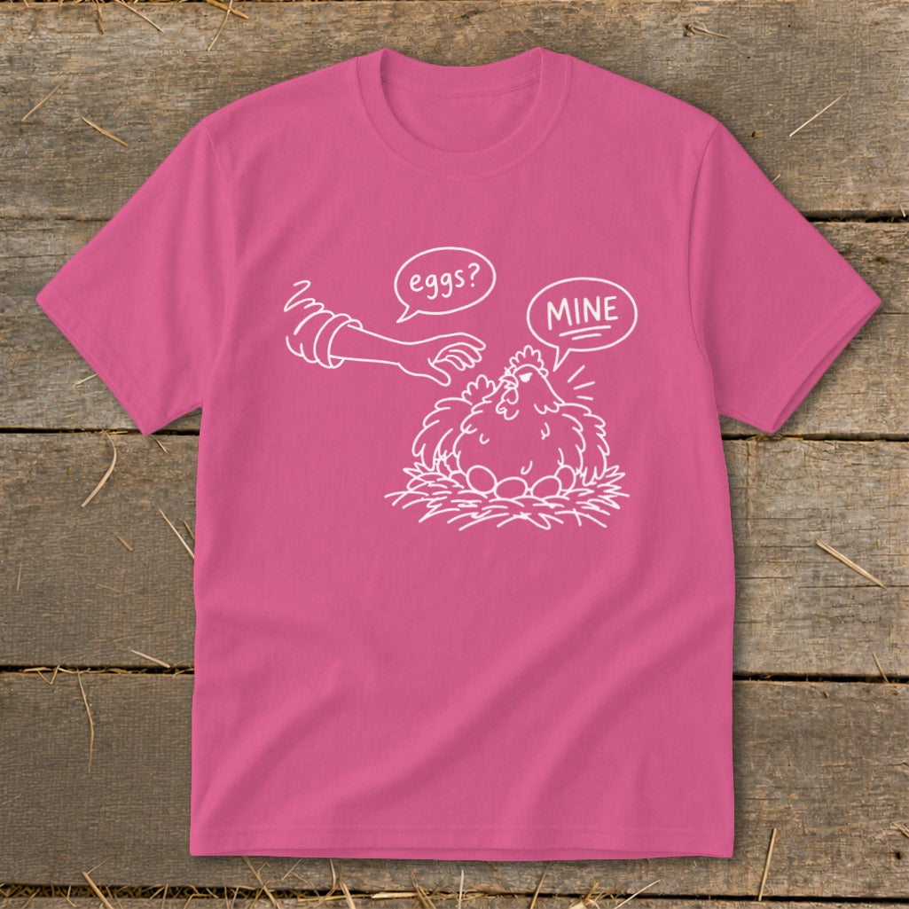 Pink t-shirt with chicken, eggs, and speech bubbles saying "eggs?" and "MINE".