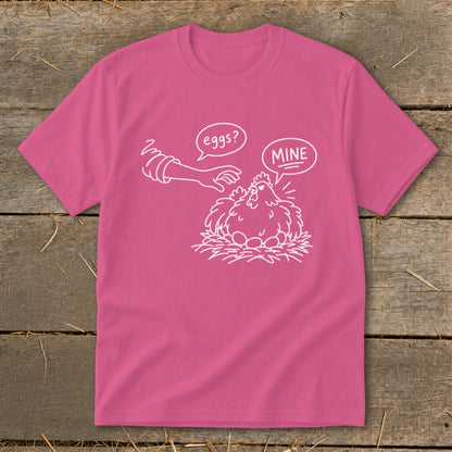 Pink t-shirt with chicken, eggs, and speech bubbles saying "eggs?" and "MINE".