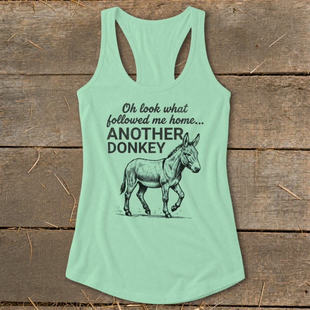 Mint tank top with "Oh look what followed me home... ANOTHER DONKEY" text and donkey graphic.