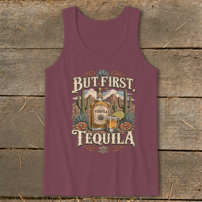 Maroon tank top with desert landscape, tequila bottle, shot glass, and text "But First, Tequila."