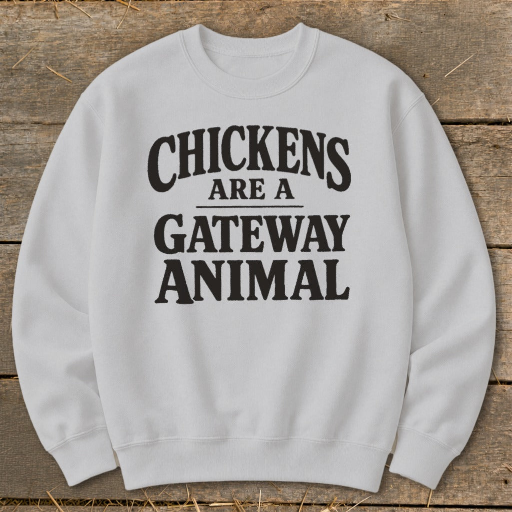 White sweatshirt with black text that reads "Chickens are a gateway animal".
