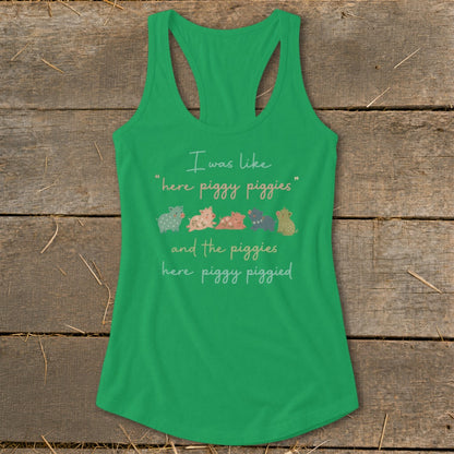 Green tank top with text and five colorful patterned pigs.
