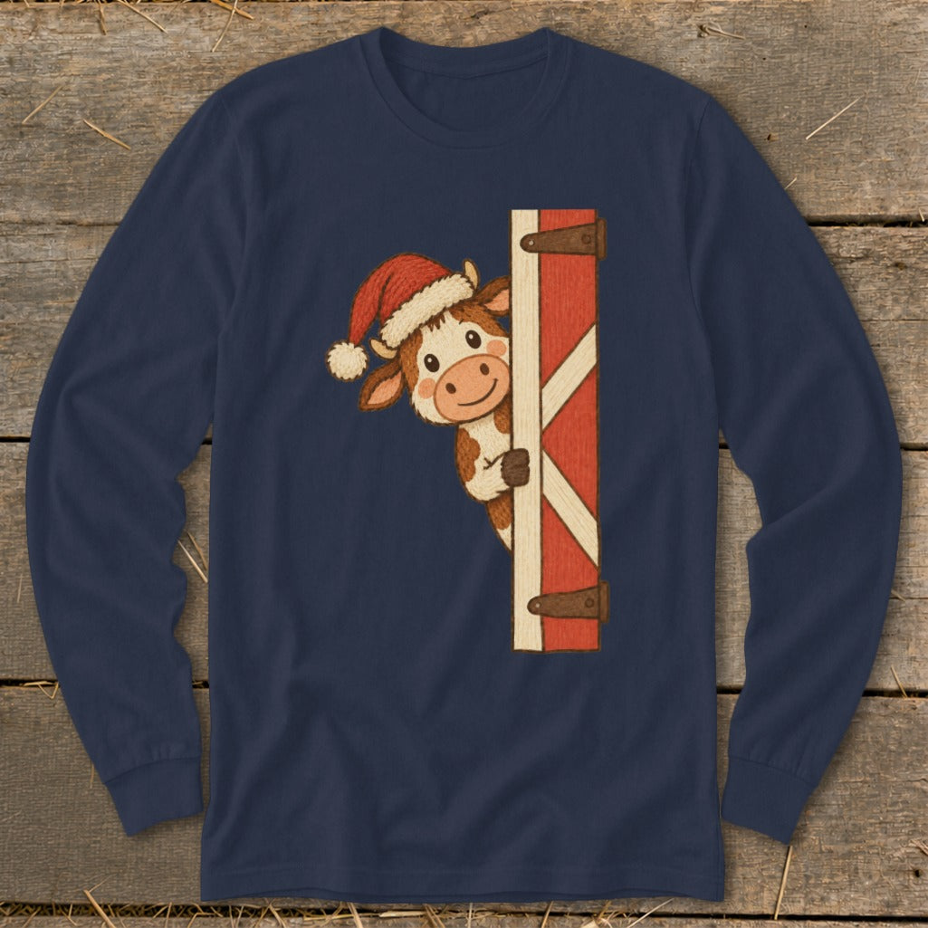 Long sleeve navy shirt with a cartoon cow in a Santa hat peeking from behind a barn door.