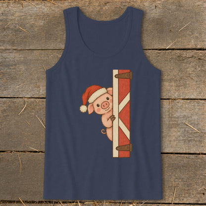 Navy tank top with a cartoon pig wearing a Santa hat peeking from behind a red barn door.