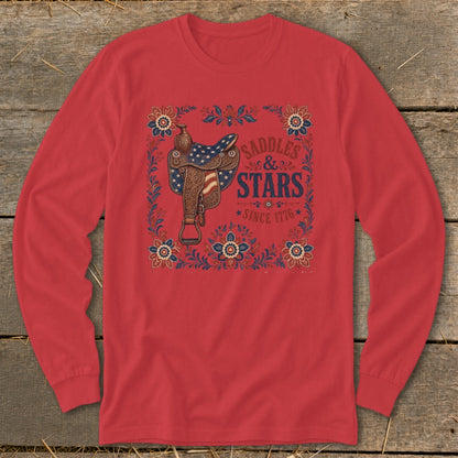 Red long-sleeve shirt with "Saddles & Stars Since 1776" graphic featuring a saddle.