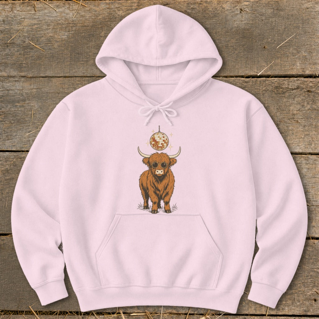 Pink hoodie with a graphic of a Highland cow wearing sunglasses and a disco ball.