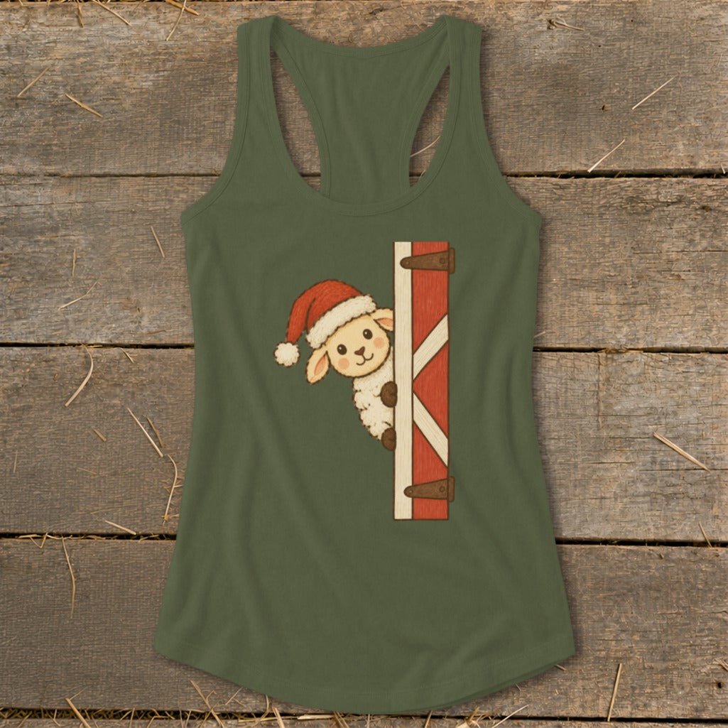 Green tank top with a Christmas sheep peeking from behind a red barn door graphic.