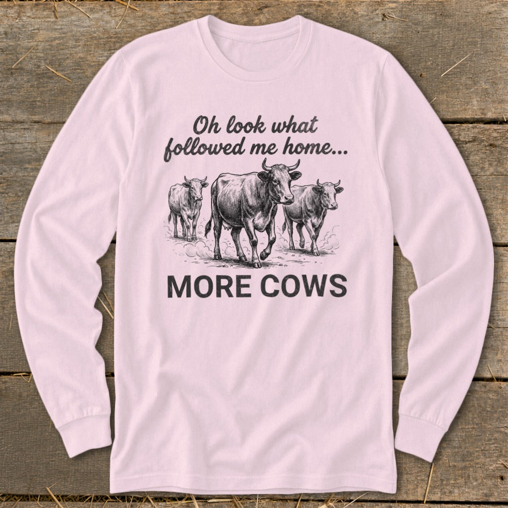Long-sleeve shirt with three cows and text "Oh look what followed me home... MORE COWS."