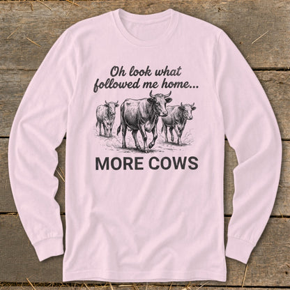 Long-sleeve shirt with three cows and text "Oh look what followed me home... MORE COWS."