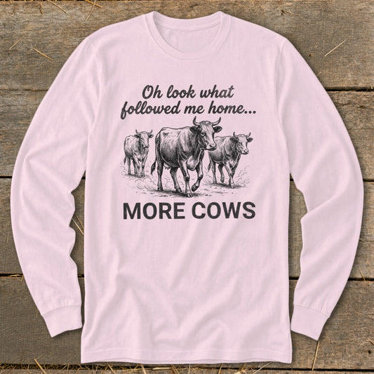Long-sleeve shirt with three cows and text "Oh look what followed me home... MORE COWS."