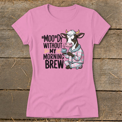 Pink t-shirt with cow graphic and text "Moo'dy Without My Morning Brew".