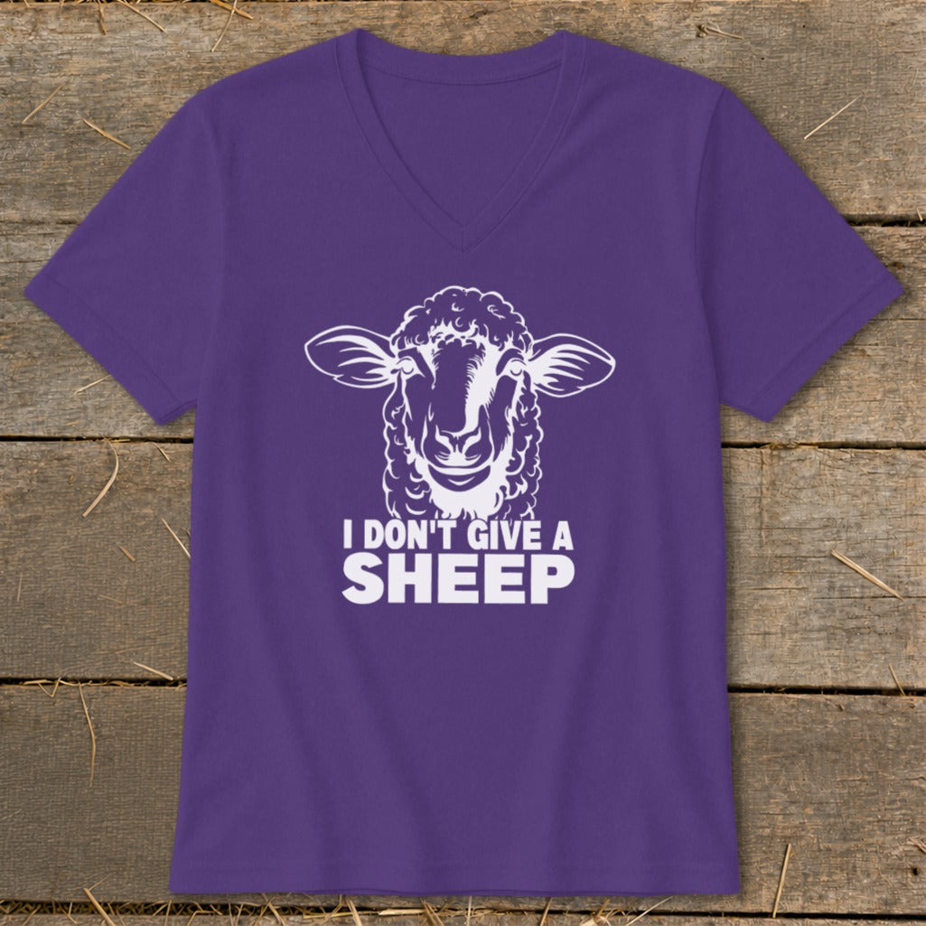 Purple v-neck t-shirt with white sheep graphic and text "I DON'T GIVE A SHEEP".