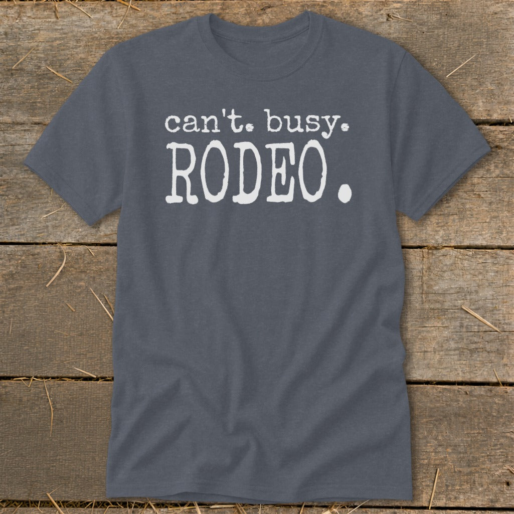 Grey t-shirt with white text that says "can't. busy. RODEO."
