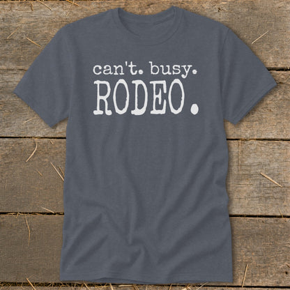 Grey t-shirt with white text that says "can't. busy. RODEO."
