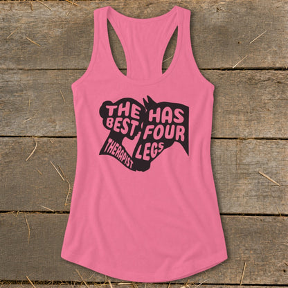 Pink tank top with black text "The has best four legs therapist".