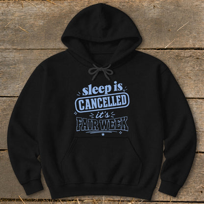 Black hoodie with "sleep is CANCELLED it's FAIR WEEK" text in light blue.