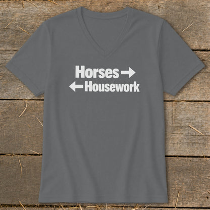 A dark gray V-neck T-shirt with the white text "Horses" pointing right and "Housework" pointing left.