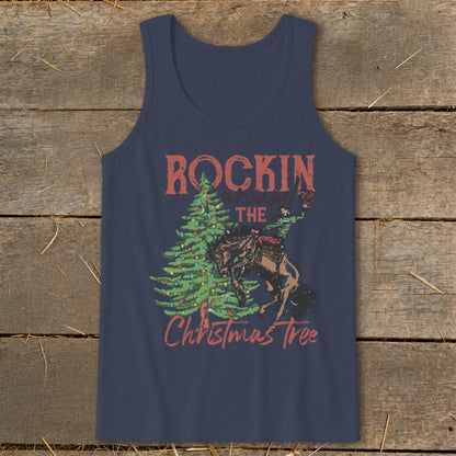 Navy tank top with graphic "Rockin the Christmas Tree" and cowboy on bucking horse.