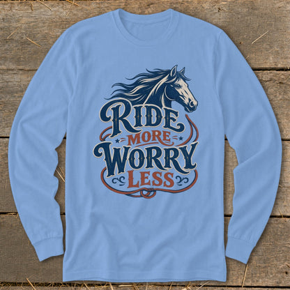 Blue long-sleeve shirt with horse graphic and text "Ride More Worry Less."