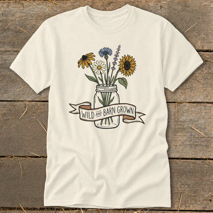 Cream t-shirt with a mason jar bouquet and "WILD AND BARN GROWN" banner.