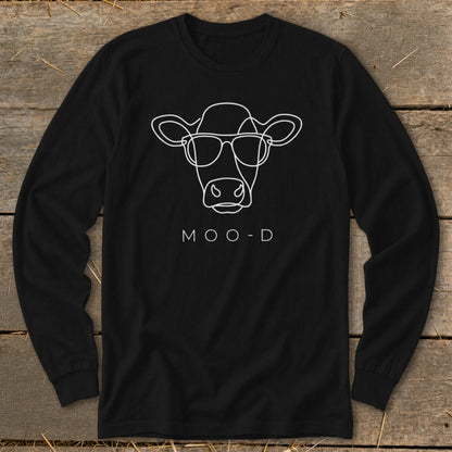 Black long-sleeve shirt with white line art cow wearing glasses and text "MOO-D".