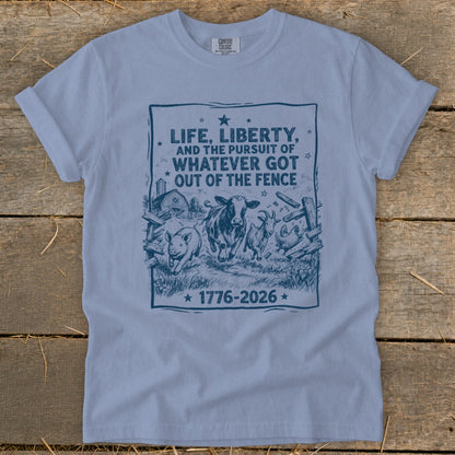 T-shirt with "Life, Liberty, And The Pursuit Of Whatever Got Out Of The Fence" text and farm animals.