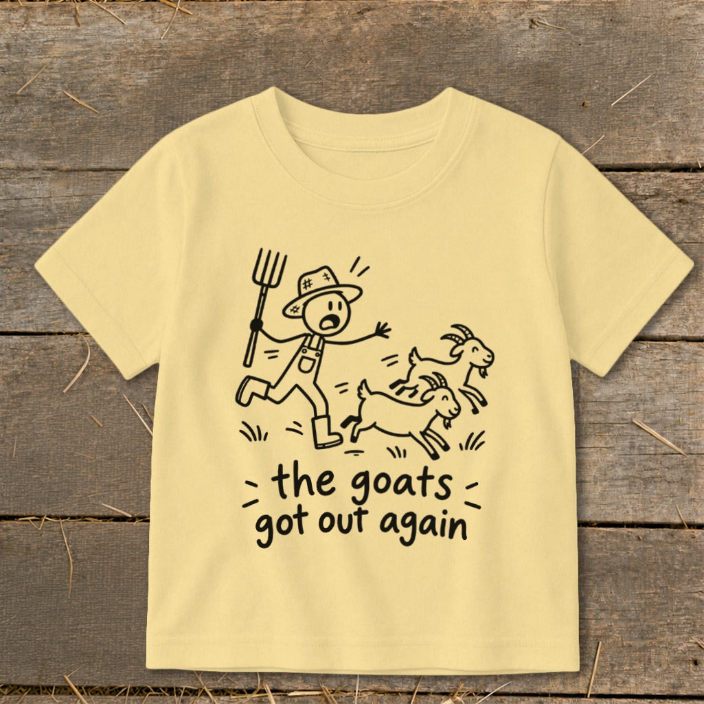 T-shirt with drawing of farmer chasing goats and text "the goats got out again".