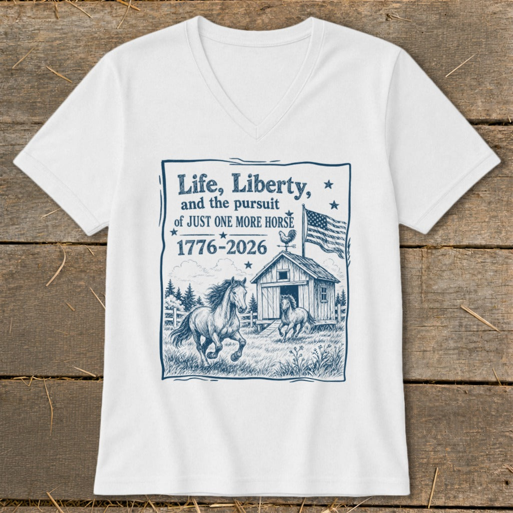 White t-shirt with "Life, Liberty, and the pursuit of JUST ONE MORE HORSE 1776-2026" and horse graphic.