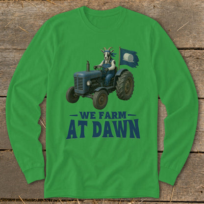 Goat in overalls drives blue tractor, flying flag, text reads "WE FARM AT DAWN".