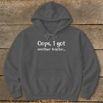 Gray hoodie with white text reading "Oops, I got another tractor..."