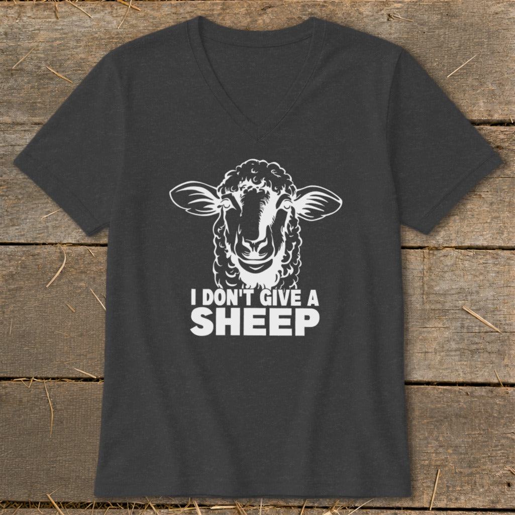 Dark grey v-neck t-shirt with a white sheep graphic and text that reads "I DON'T GIVE A SHEEP".