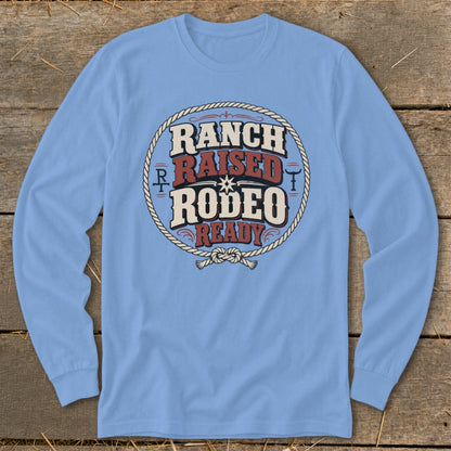 Light blue long-sleeve shirt with "Ranch Raised Rodeo Ready" text in a circle.